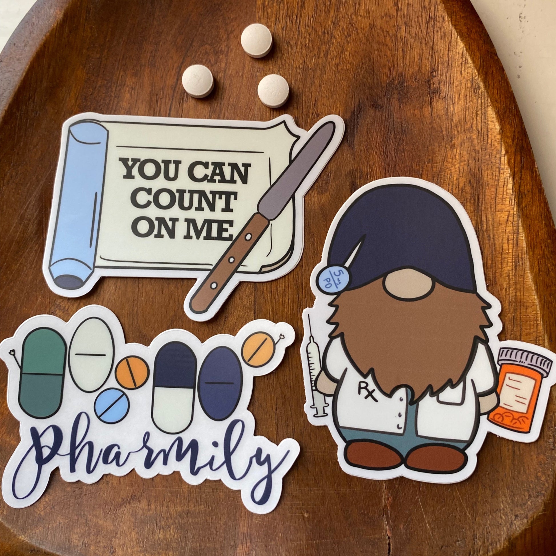 3 Pack of Stickers contains you can count on me tray, pharmacy gnome male, and clear Pharmily sticker. 